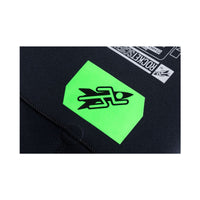 Close-up of BASIC wetsuit with green and white text and design on a black background with Rocket Science Sports logo