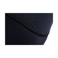 Close-up of BASIC wetsuit stitching detail showing flatlock seam on black neoprene material.