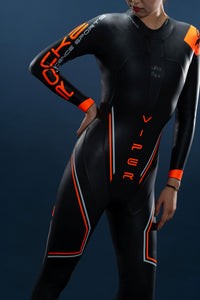 Close-up of Rocket Science Sports Viper women’s wetsuit showing ultra-flex chest panel and orange performance detailing