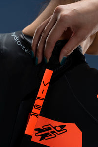 Close-up of Viper wetsuit back zipper with hydro-seal collar and pull tab