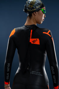 Back view of woman wearing Rocket Science Sports Viper wetsuit with reverse zipper and Yamamoto neoprene