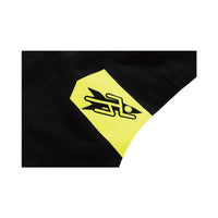 Close-up of Rocket Science Sports icon logo on high-visibility yellow panel of the VENOM swimskin