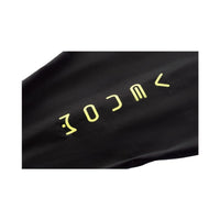 Close-up of Rocket Science Sports VENOM swimskin logo printed on black performance fabric