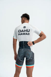 Person wearing a cycling outfit with 'Oahu Hawaii' text on a white background
