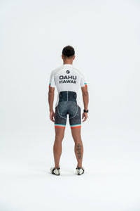 Person wearing a cycling outfit with 'Oahu Hawaii' text on a white background