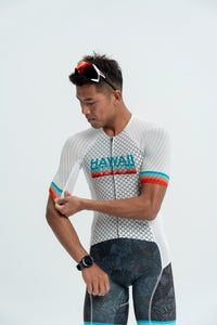 Person wearing a cycling jersey with 'Hawaii' text on a white background