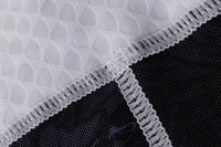 Close-up of textured fabric with a patterned border
